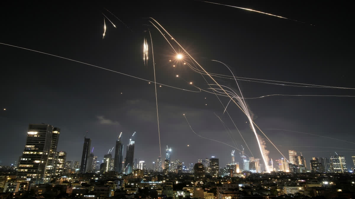 iran israel conflict, missile attacks, nuclear sites, us airstrikes, ashdod, jerusalem, tel aviv, haifa, tehran, karaj, war escalation, middle east conflict, military bases, economic hubs, port cities, air defense, retaliatory strikes, imam hussain military base, irgc